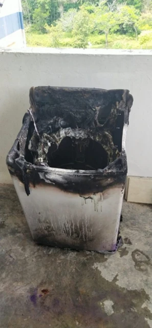 洗衣機使用中突起火