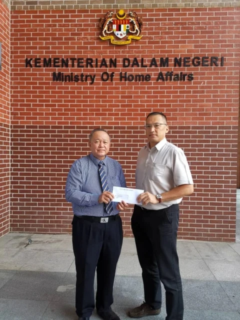 沙巴商人苦等14年來　終為長子取得大馬公民權