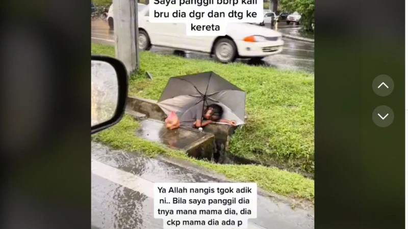 雨天撐傘沿路賣芒果 女童累垮趴溝渠入睡