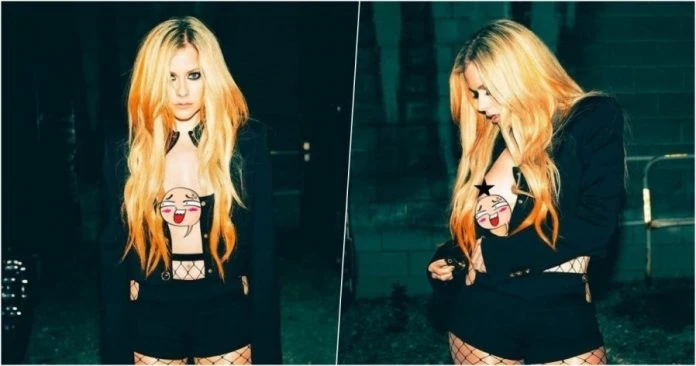 艾薇兒曬火辣照　中門大開露半峰