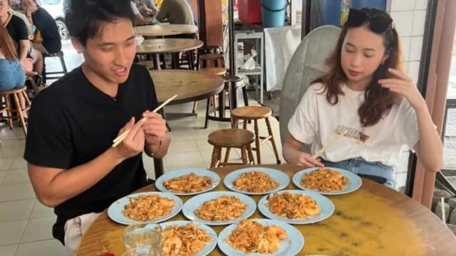 本地「大胃王」梁照遠遊檳城 40分鐘幹掉18碟炒粿條