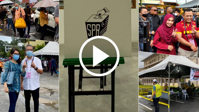 【大馬選舉】投票日多地降雨 選民撐傘排隊