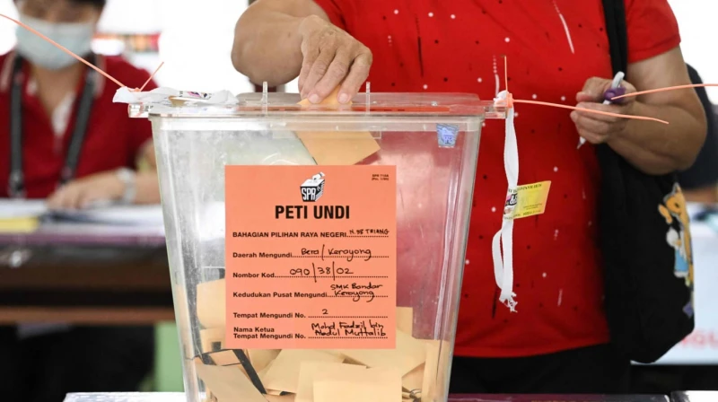 【相冊】全馬多地下雨 選民雨中排隊投票