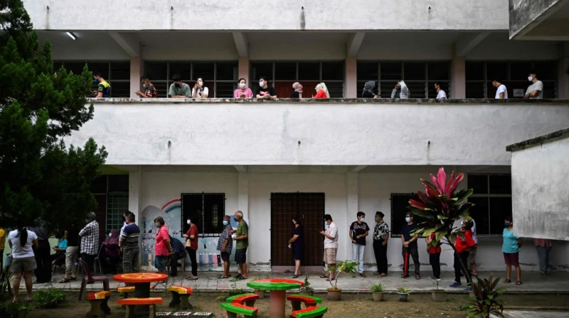 【相冊】全馬多地下雨 選民雨中排隊投票