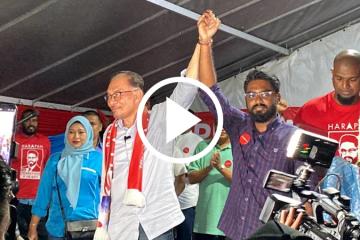 【大馬選舉】千人雨中力挺安華「當首相」 蔡添強未現身希盟講座