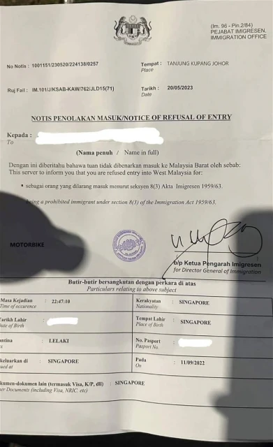 獅城夫婦被禁入境大馬半年　只因質疑官員跳頁蓋章