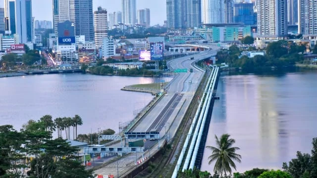 越堤賺新元有了金錢沒生活 獅城男為陪妻兒選到馬國工作