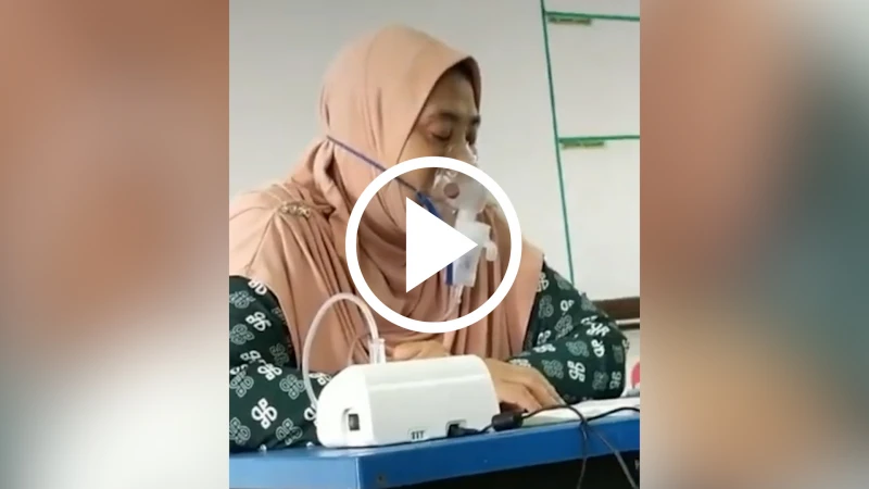 染疫得氣喘後遺症  女教師上課依賴輸氧器