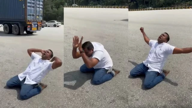 得悉安華確定任首相 鐵粉在馬路五體投地歡呼